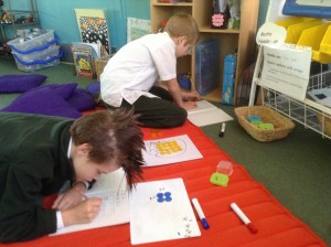 Jon and Kia work hard to discover as many square numbers as they can and lots of other related number facts along the way. Great work boys!